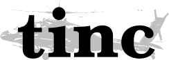 The Logo for Tinc. It has a black and white image of an Apache attack helicopter with the work "Tinc" written across it.