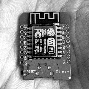 Wemos D1 Mini microcontroller with ESP8266 chip visible in the centre.